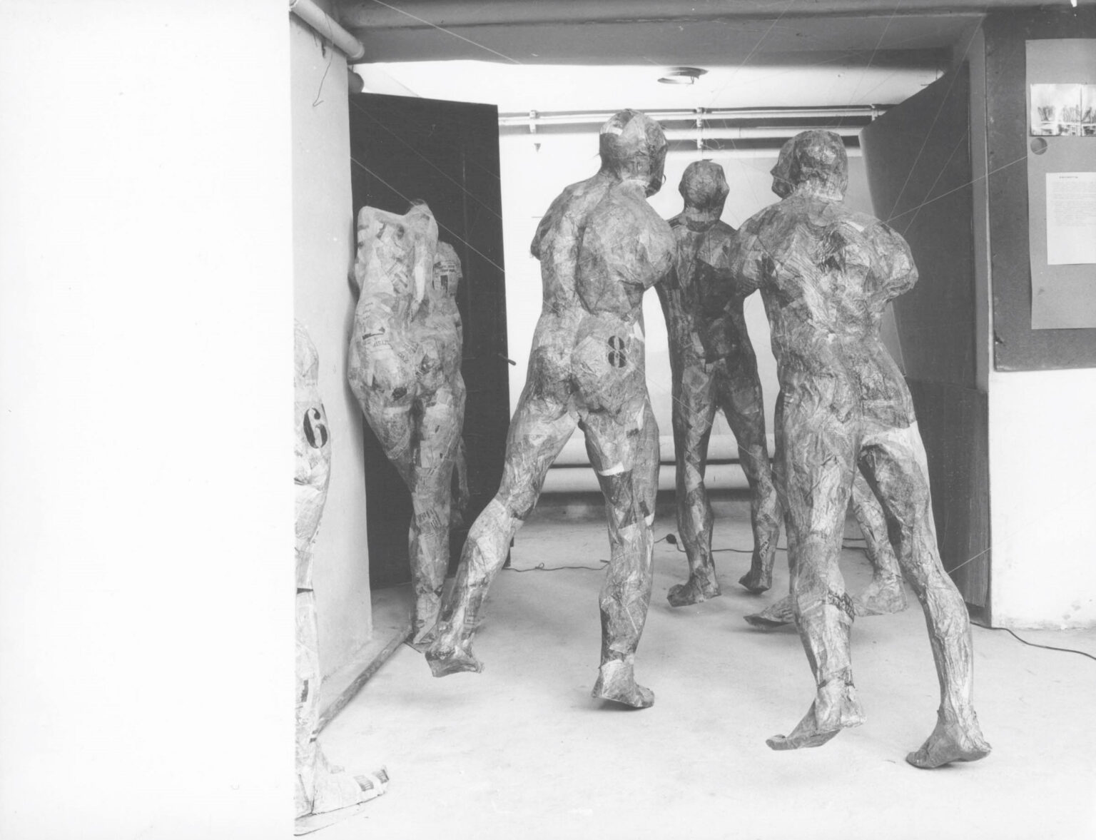 b-w photo of sculptures in a studio